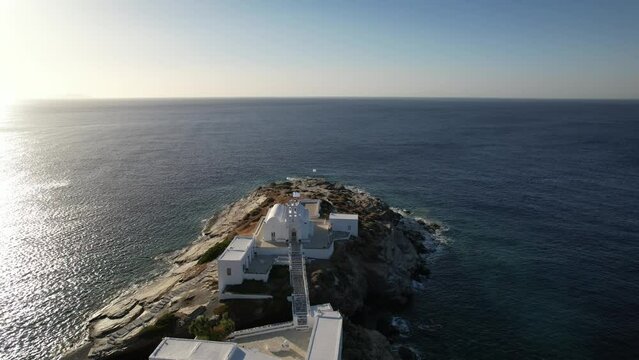View of Chrysophygi Monastery and Paros on the south east coast of the island, Sifnos, Greece
