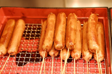  Grilled hot dogs on a tray