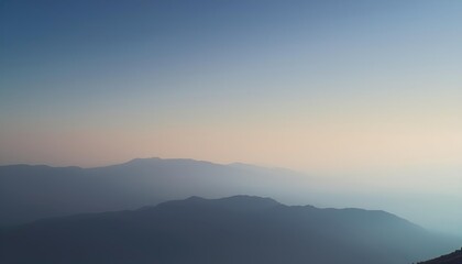 Serene Mountain Range At Sunrise Horizon
