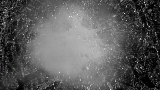 Breaking Glass.
This stock motion graphics video shows glass shattering.