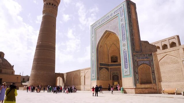 View of Kalan Minaret Emir and Alim Khan madrasah of Po-i-Kalan (Poi Kalan) - islamic religious complex Bukhara, Uzbekistan