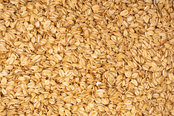 Oat-flakes as a background. Top view.