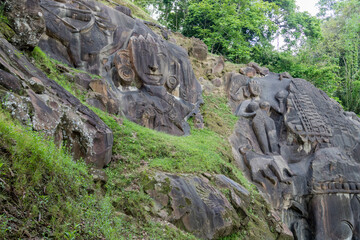Unakoti a hindu archaeological site of bas relief structures from the ninth century. A must visit tourist destination in Tripura state of India.