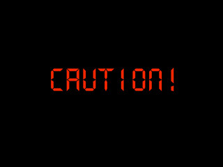 Caution in black and red display.