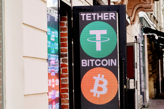 Digital money bitcoin tether crypto currency exchange rate board in bank.numbers correlation,electronic sign led billboard.Stockmarket trading.financial market price-Ukraine,Lviv,30 October 2023