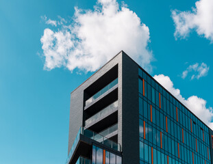 Black modern building with glass wall