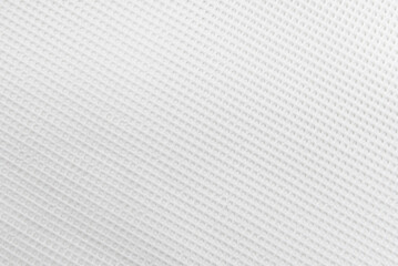 Texture of a white mesh silicone mat. Silicone material background. Net