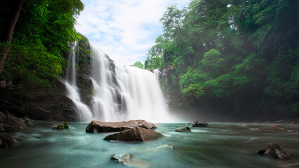 Beauty in nature, amazing waterfall in tropical forest of national park, Thailand