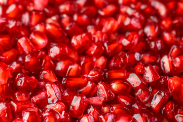A beautiful red pomegranate seeds background 1