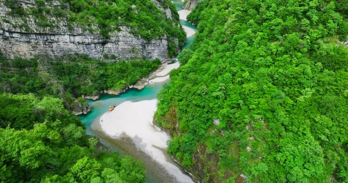 Aerial video of Shala river and its clear blue waters with lush forests in northern Albania. 