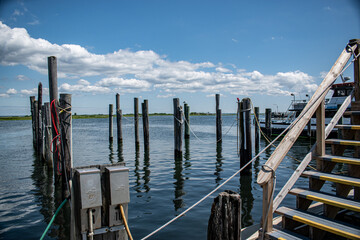 Boat docks and marine pilings blue skies