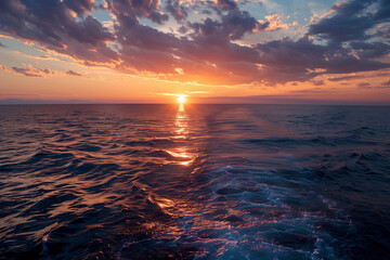 Sunset over the sea. Beautiful sunset over the sea. The sun is reflected in the water.