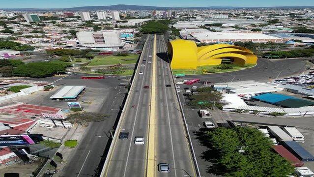 Vertical video of traffic on Mariano Otero Avenue in Guadalajara, Millennium Arches, Mexico