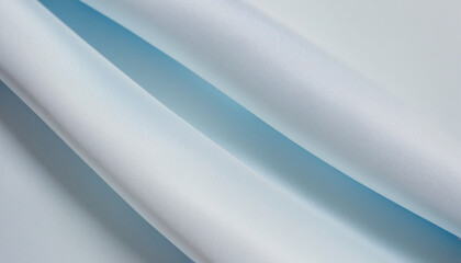 Obraz premium Elegant sky blue and white satin fabric backdrop with copy space