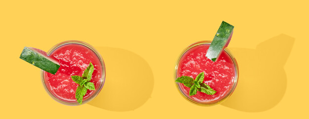 Strawberry smoothie in cup on yellow pastel background