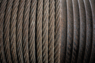 old and vintage iron cable on spool .