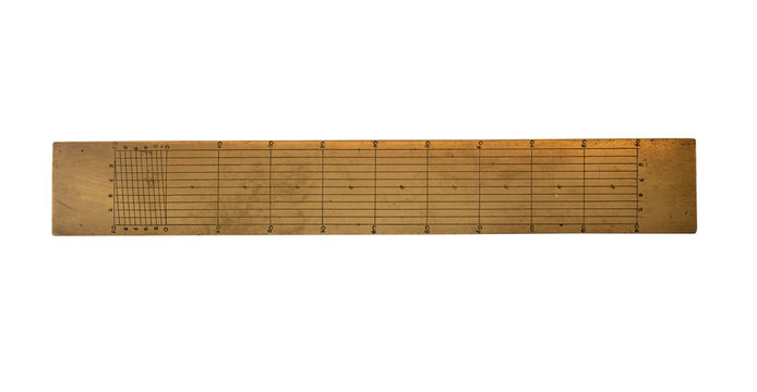 ancient copper ruler on white, isolated