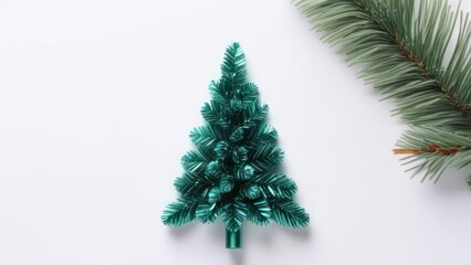 Obraz premium New year's composition. Artificial christmas tree gift and decorations on white background. Christmas winter, new year concept. Flat lay, top view, copy space