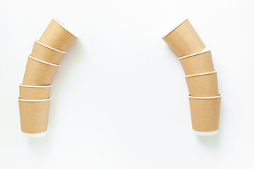 Stack of recyclable coffee paper cups, top view. Eco-friendly zero waste products