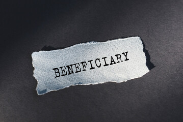 Torn Piece of Paper With the Word Beneficiary