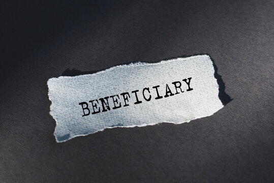 Torn Piece of Paper With the Word Beneficiary