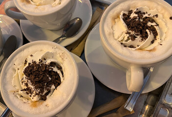 Cups of cappuccino. Cafe. Rest.
