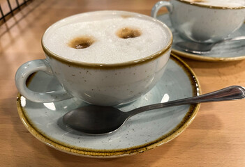 Cups of cappuccino. Cafe. Rest.