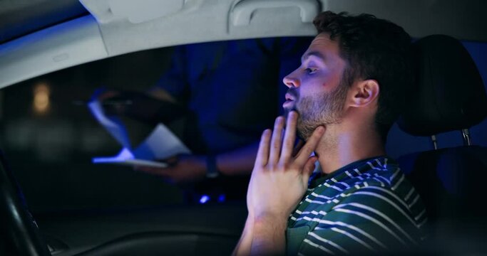 Traffic, stress and man in car with police, lights and frustrated for driving, speed or siren at night. Travel, transport and driver in vehicle with highway patrol, ticket or compliance in street
