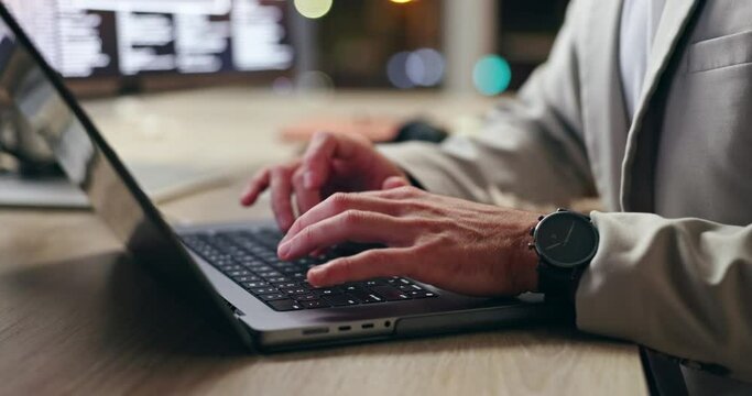 Laptop, night and hands typing code, software and business person research for project deadline in office. Computer, keyboard or professional programmer writing info for cybersecurity network closeup