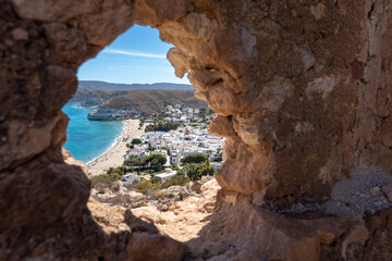 Overview of Agua Amarga Village Through Ruined Wall Gap