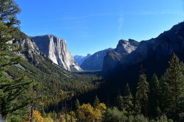 View of the majestic Yosemite Valley on a sunny day with a clear blue sky