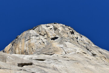 Climber POV at the bottom of El Capitan rock wall in Yosemite Valley