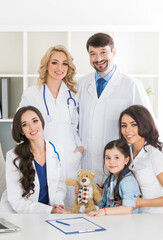 happy family and doctor smile