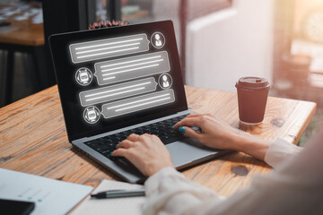 Chat GPT concept, Businesswoman using laptop computer on desk with Chat GPT icon on virtual screen,...