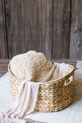 Brown basket, digital photography background for newborn and baby. Selected focus.