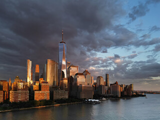 Fototapeta premium NYC aerial view, New York City Skyline with dramatic sky. Panoramic drone view on Manhattan in NY.