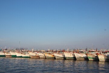 Fototapeta premium Many fishing boats are anchored at Nizam Zachman port, Jakarta, Indonesia.