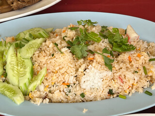 fried rice with pork, fried egg and vegetable
