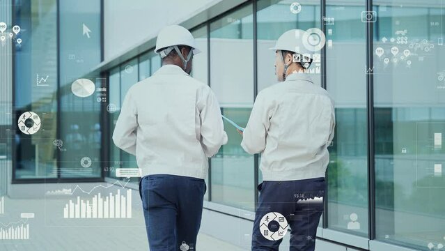 Multinational group of engineers and digital data concept