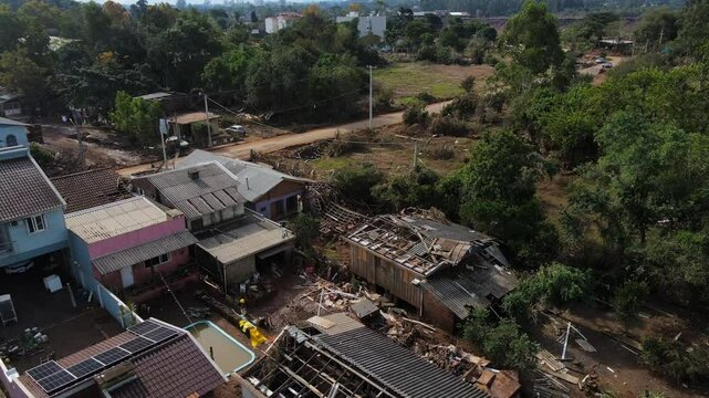 South Brazil Floods 2024 - Upwards Drone shot of Taquari River and aftermath of floods in Cruzeiro do Sul City - Rio Grande do Sul