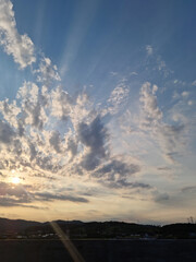 Dark mountain silhouette and sunset sky.