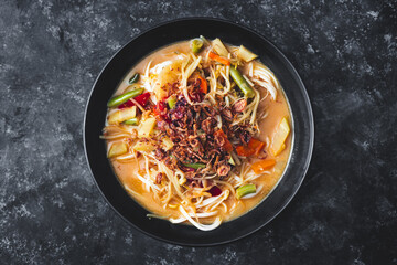 vegetarian rice noodle ramen with mixed veggies and fried shallots
