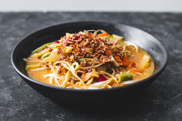 vegetarian rice noodle ramen with mixed veggies and fried shallots