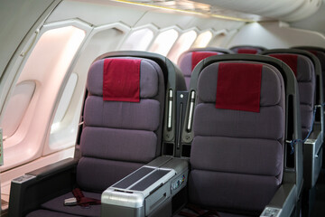 Plane row seats air craft business class window cabin interior travel holiday sit fly comfort