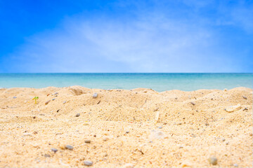 Nature of the beach and sea Summer with sunshine, sandy beaches, clear blue waters sparkling against the blue sky. On an island with good ecology and environment Background for summer vacation concept