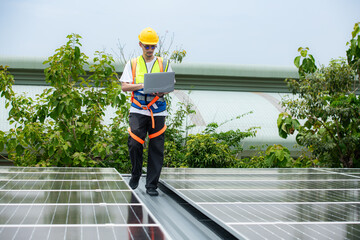 Technician inspects solar panel installation and test the operation of the panel