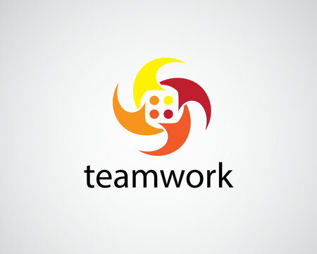 creative four people gathered together holding hands in a circle shaped like a rotating propeller logo