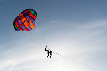parasailing,wartersport activity.silhuuette shot.