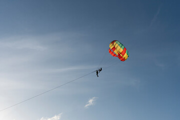 parasailing,wartersport activity.silhuuette shot.