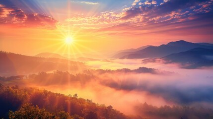 Obraz premium Beautiful sunrise landscape with hilltops rising out of the fog